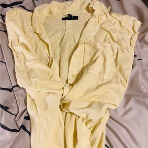 Sleeveless button down top